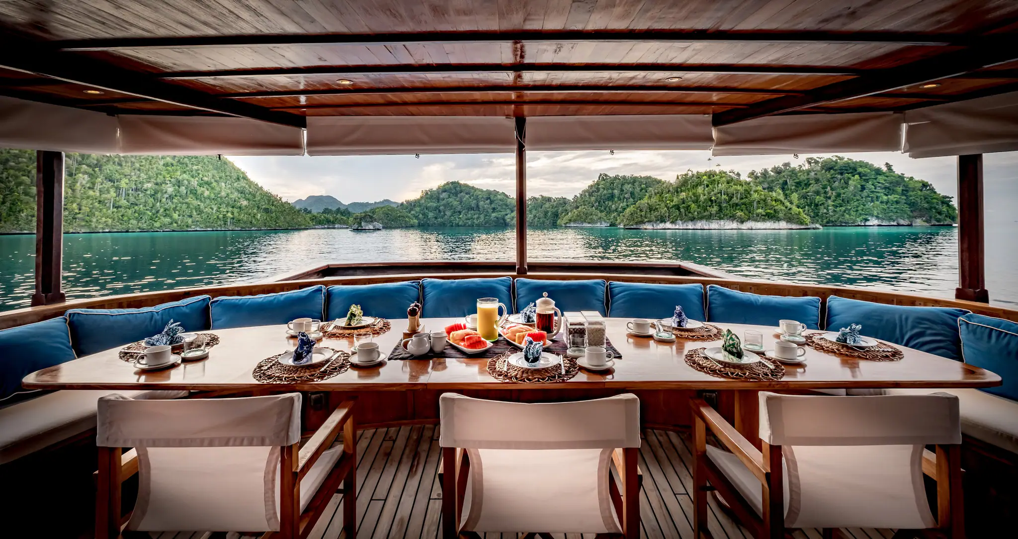 Rascal Adventure Yacht | Open air dining with lagoon views