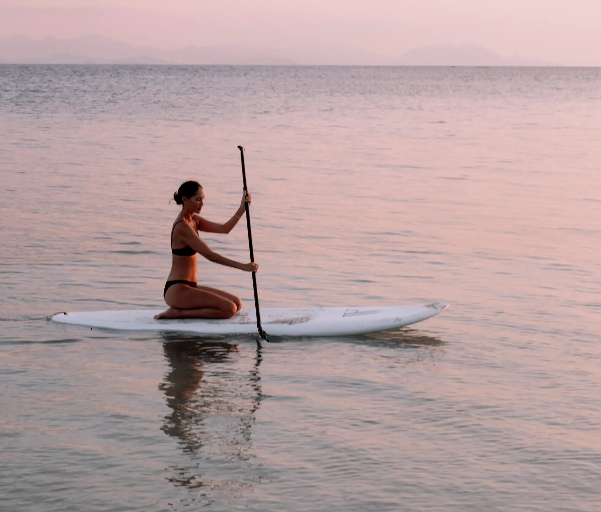 Aliikai Voyage Luxury Yacht Activities SUP | Aliikai Voyage Paddleboarding at Sunset