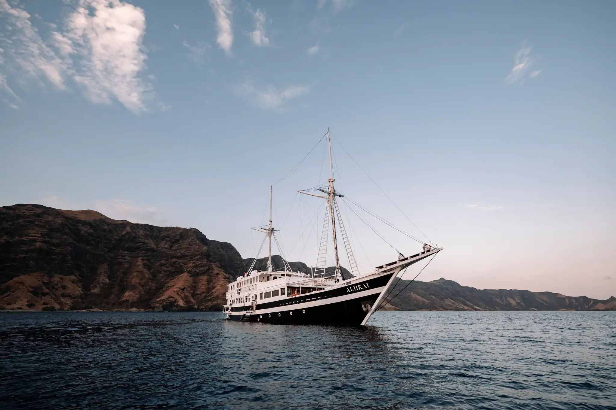 Aliikai Voyage Luxury Yacht Vessel | Aliikai anchored besides Komodo Islands