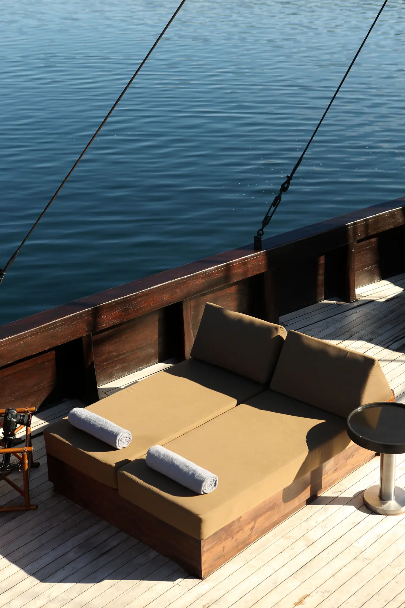 Alila Purnama Boutique Sailing Yacht | Sun loungers on wooden deck