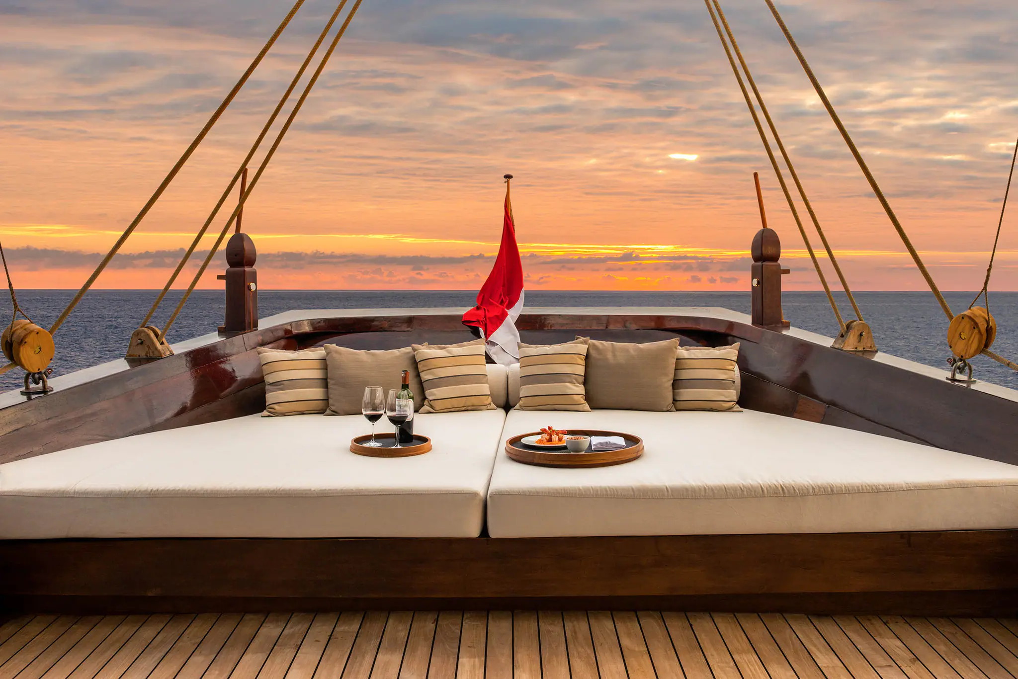 Amandira Luxury Sailing Yacht | Cabin's lounge at sunset