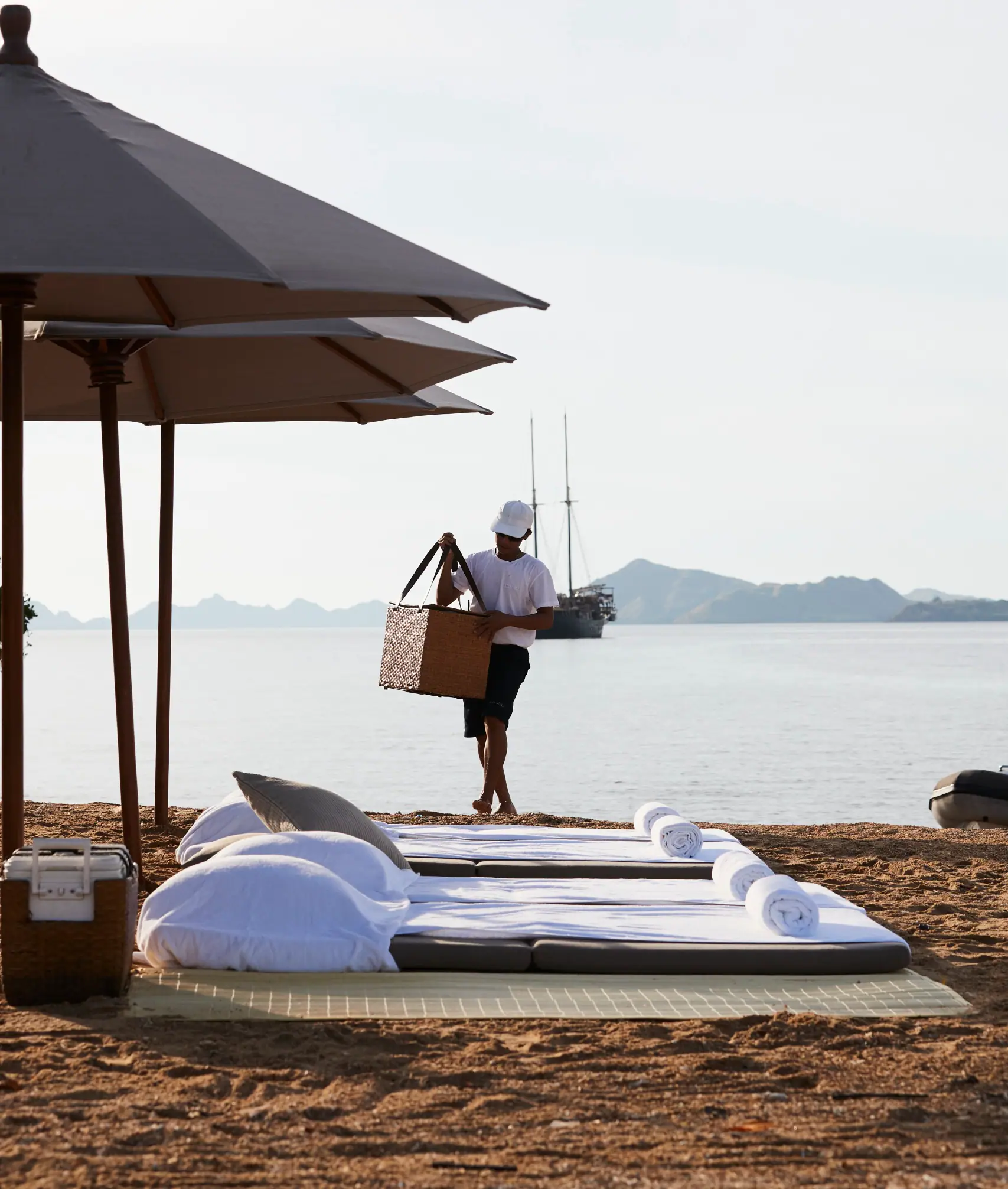 Amandira Luxury Sailing Yacht | Private beach setup with loungers