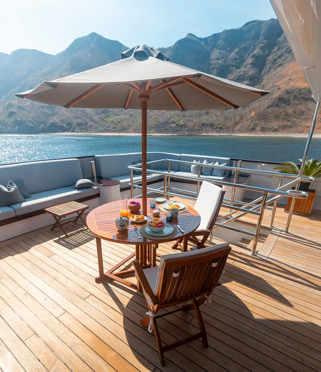 Aqua Blu Expedition Yacht | Outdoor dining deck with ocean views