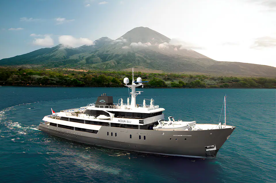 Aqua Blu Expedition Yacht | Cruising beneath volcano landscapes