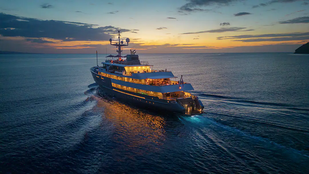 Aqua Blu Expedition Yacht | Sailing at sunset