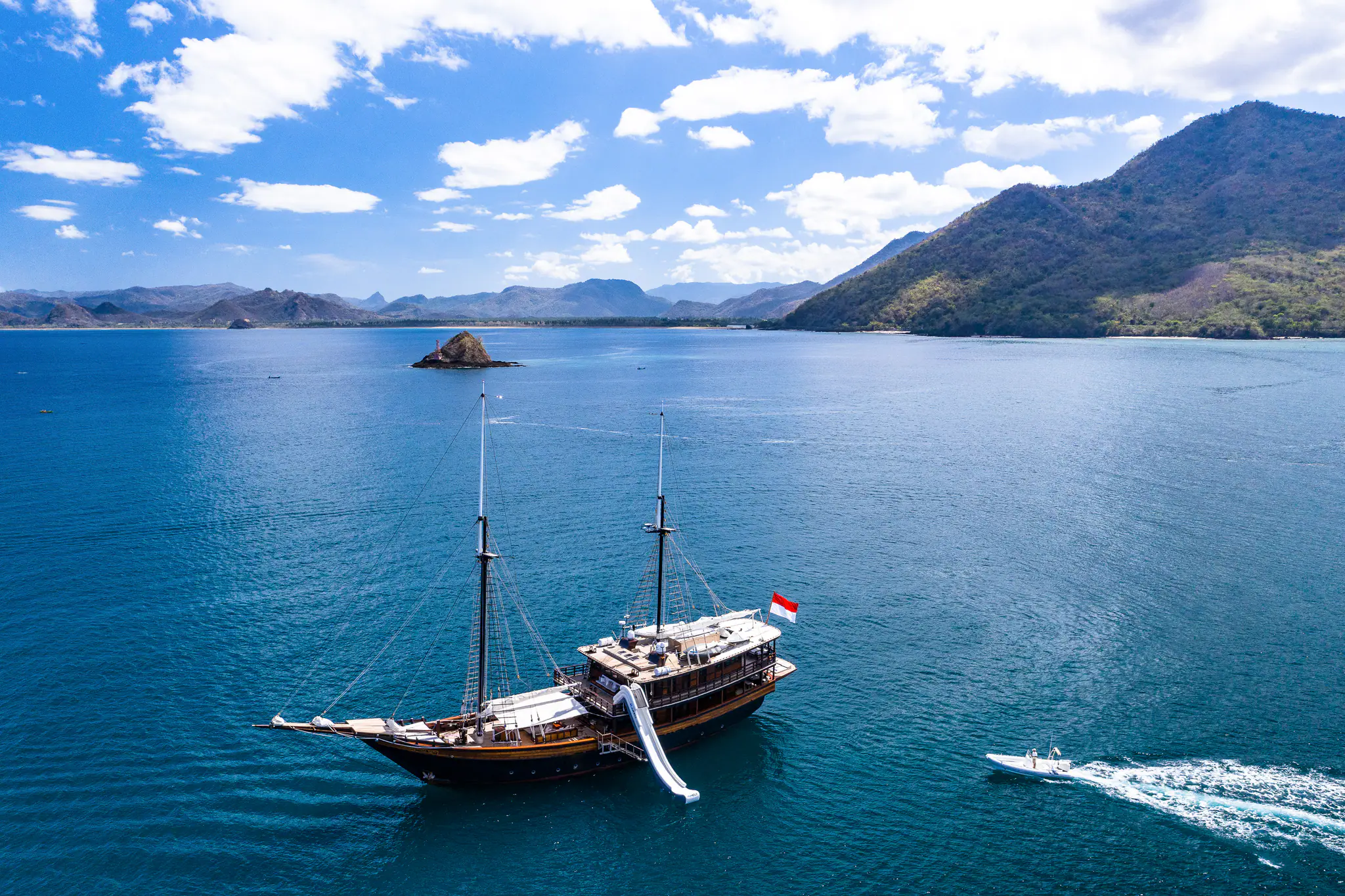 Dunia Baru Elegant Sailing Yacht | Anchored in tropical bay