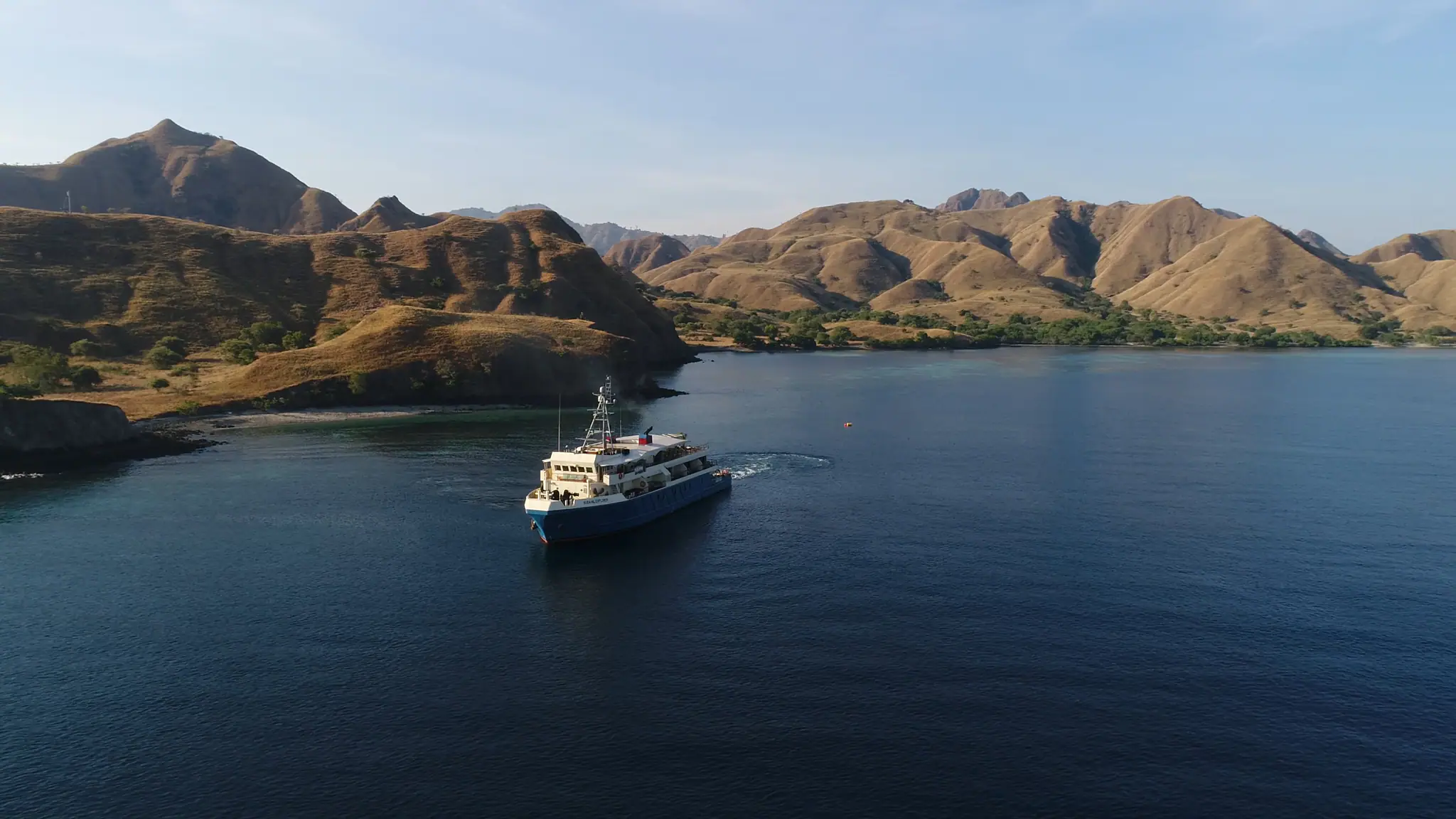 Kudanil Explorer Expedition Yacht | Anchored beside remote tropical islands