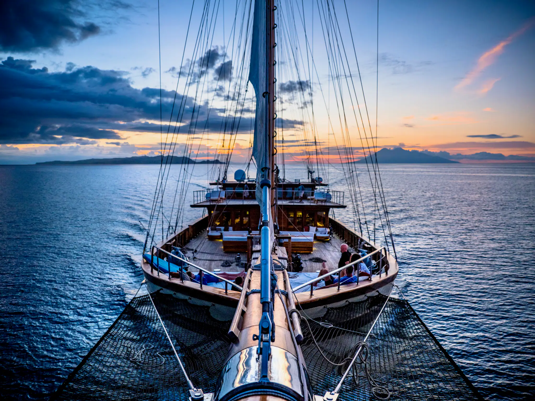 Lamima Phinisi Yacht | Lamima bow deck at sunset