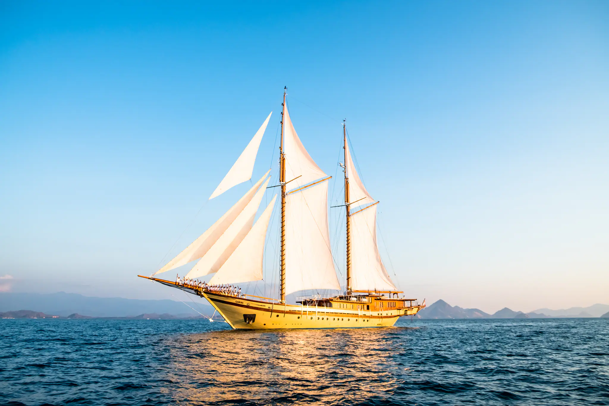 Lamima Phinisi Yacht | Lamima sailing across calm tropical waters