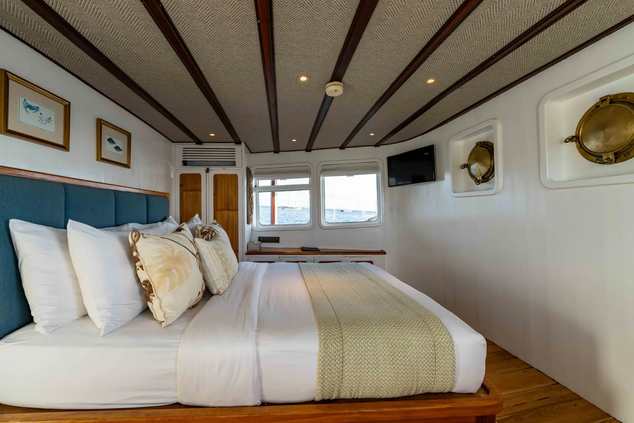 Rascal Adventure Yacht Staterooms | Side view of refined cabin