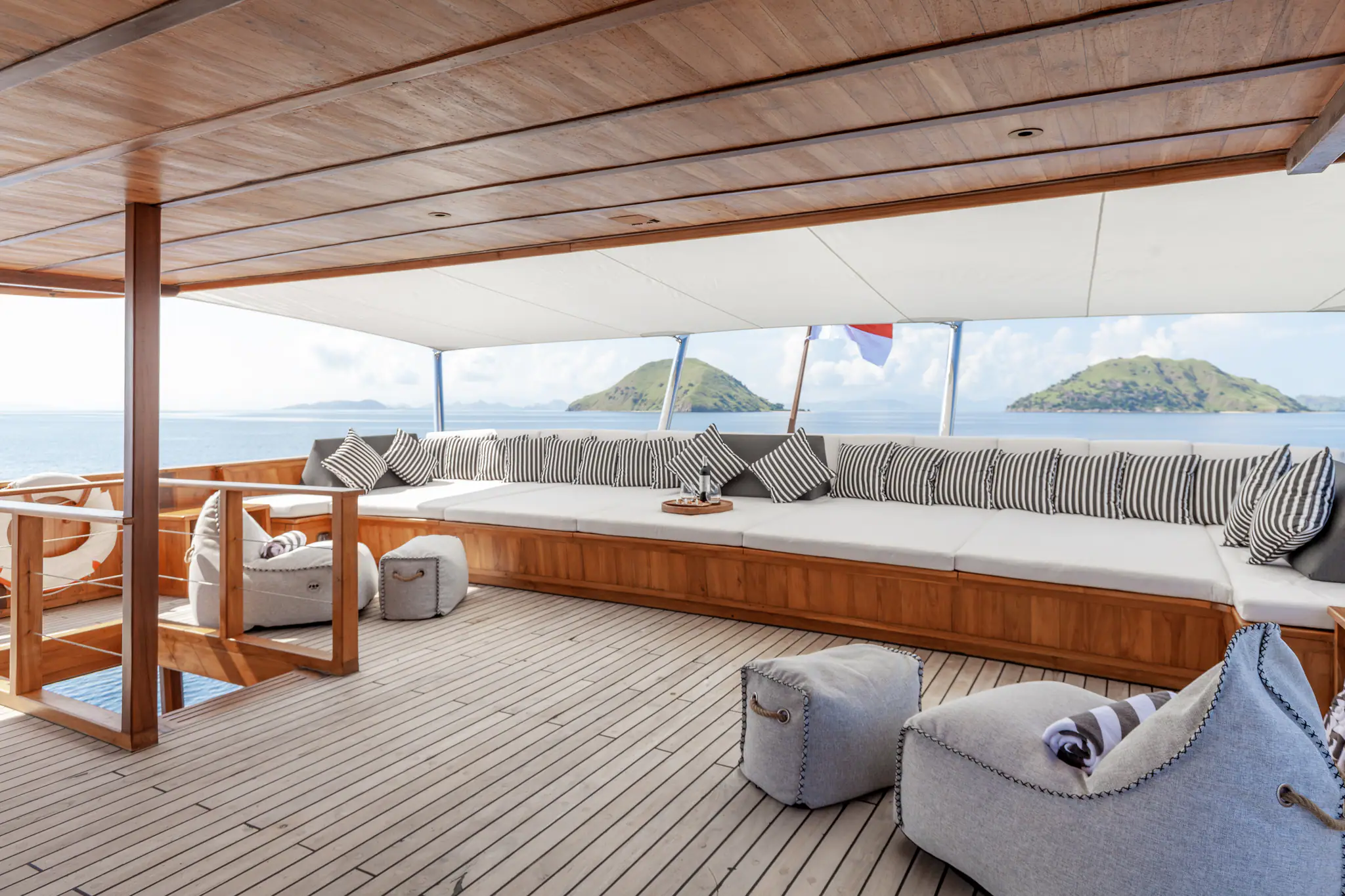 Rebel Adventure Yacht | Outdoor lounge area on aft deck