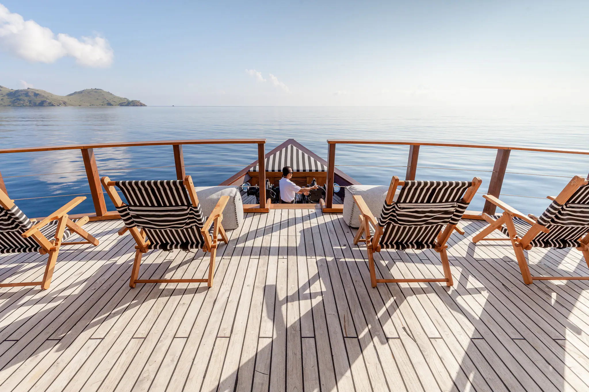 Rebel Adventure Yacht | Outdoor lounge area with sea views