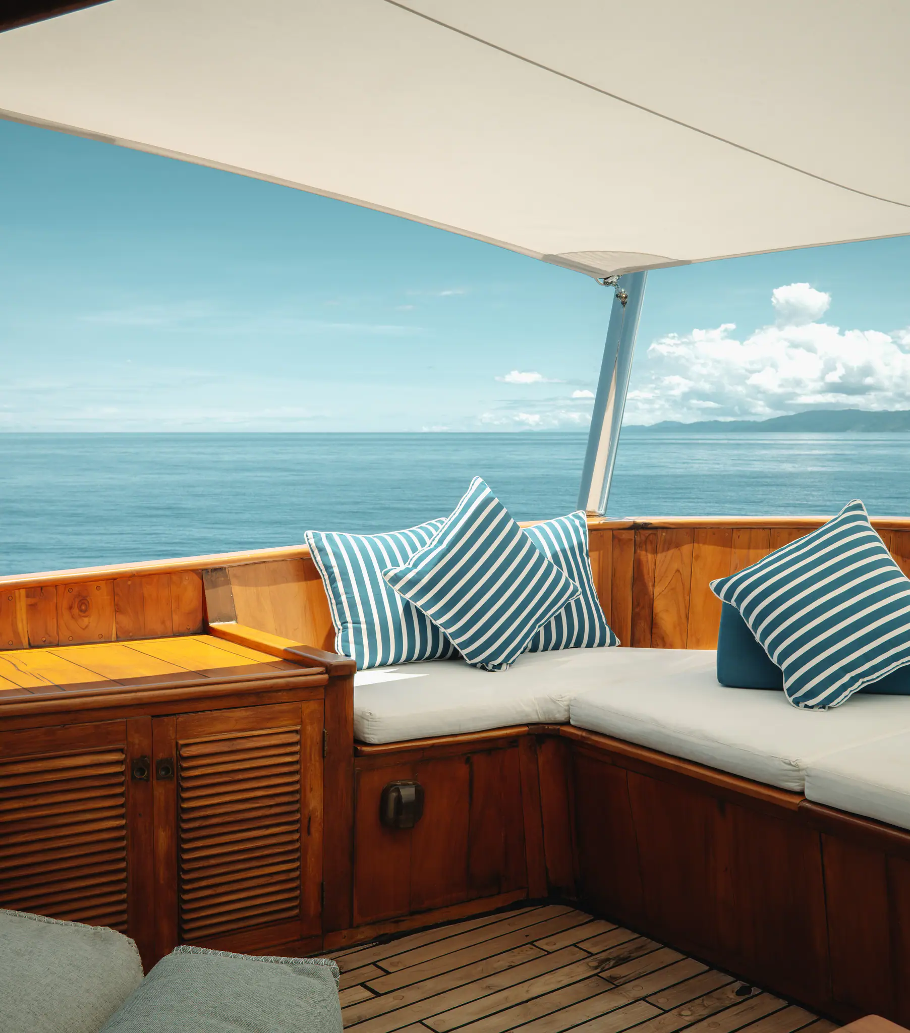 Rebel Adventure Yacht | Cozy outdoor seating with ocean views