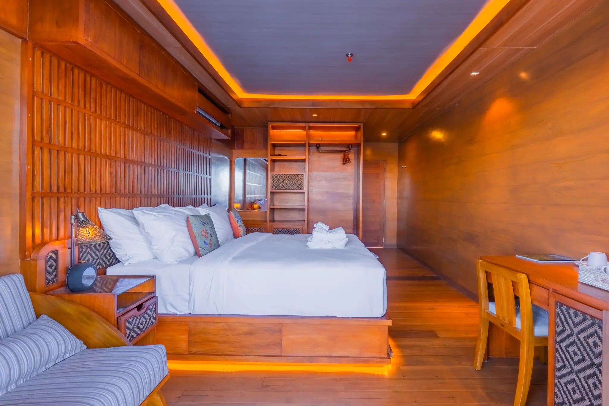 Sanctuary Grand Phinisi Yacht | Dark wood comfortable cabin