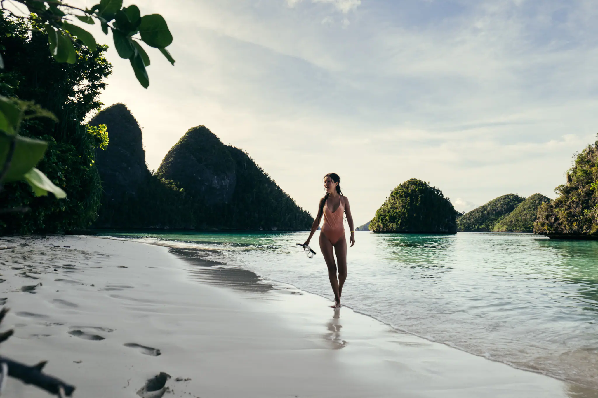 Sanya Sailing Yacht | Guest Enjoying The Tropical Beach At Dawn