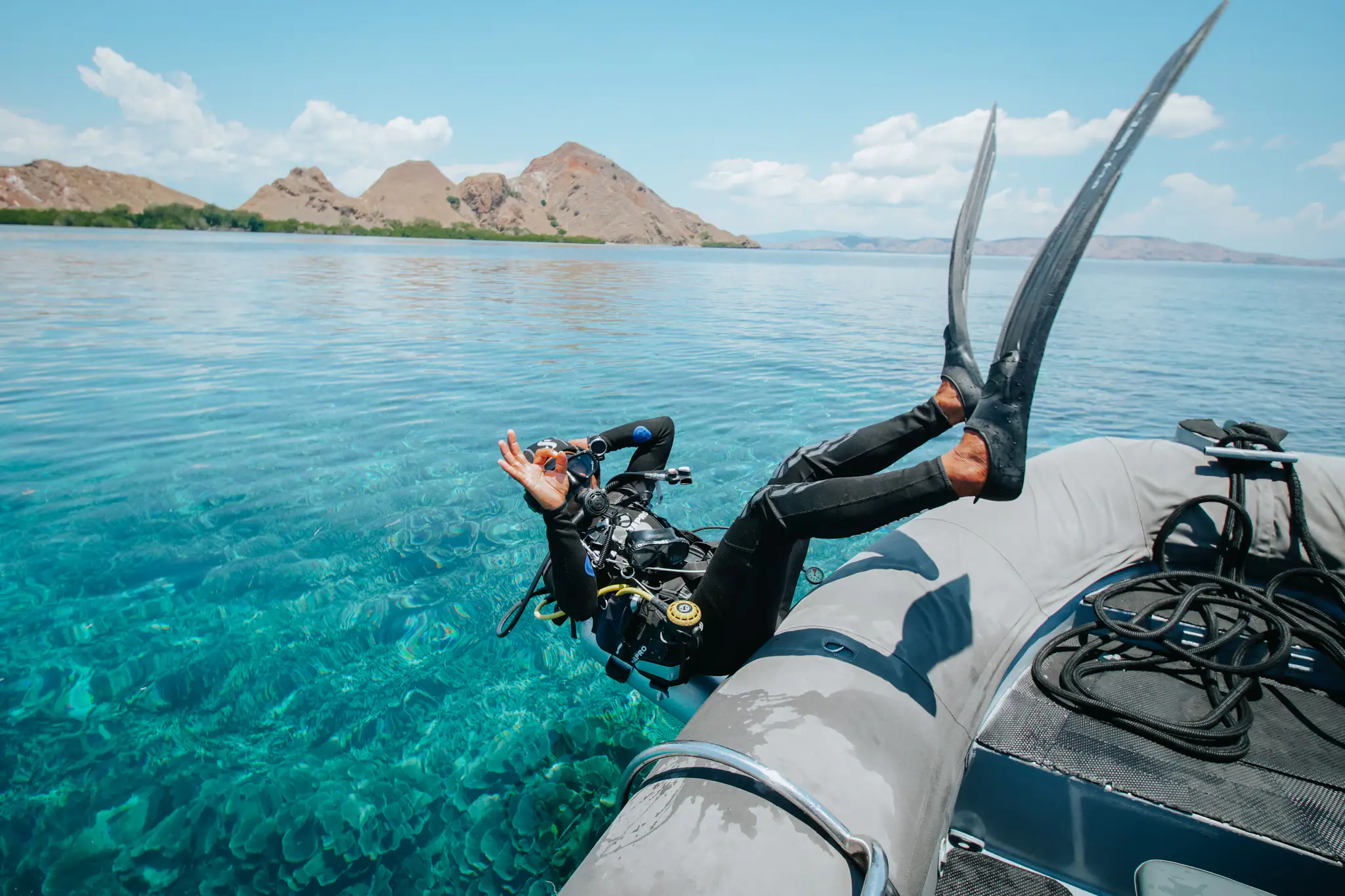The Maj Oceanic Contemporary Phinisi Yacht | Scuba diving beside tropical islands