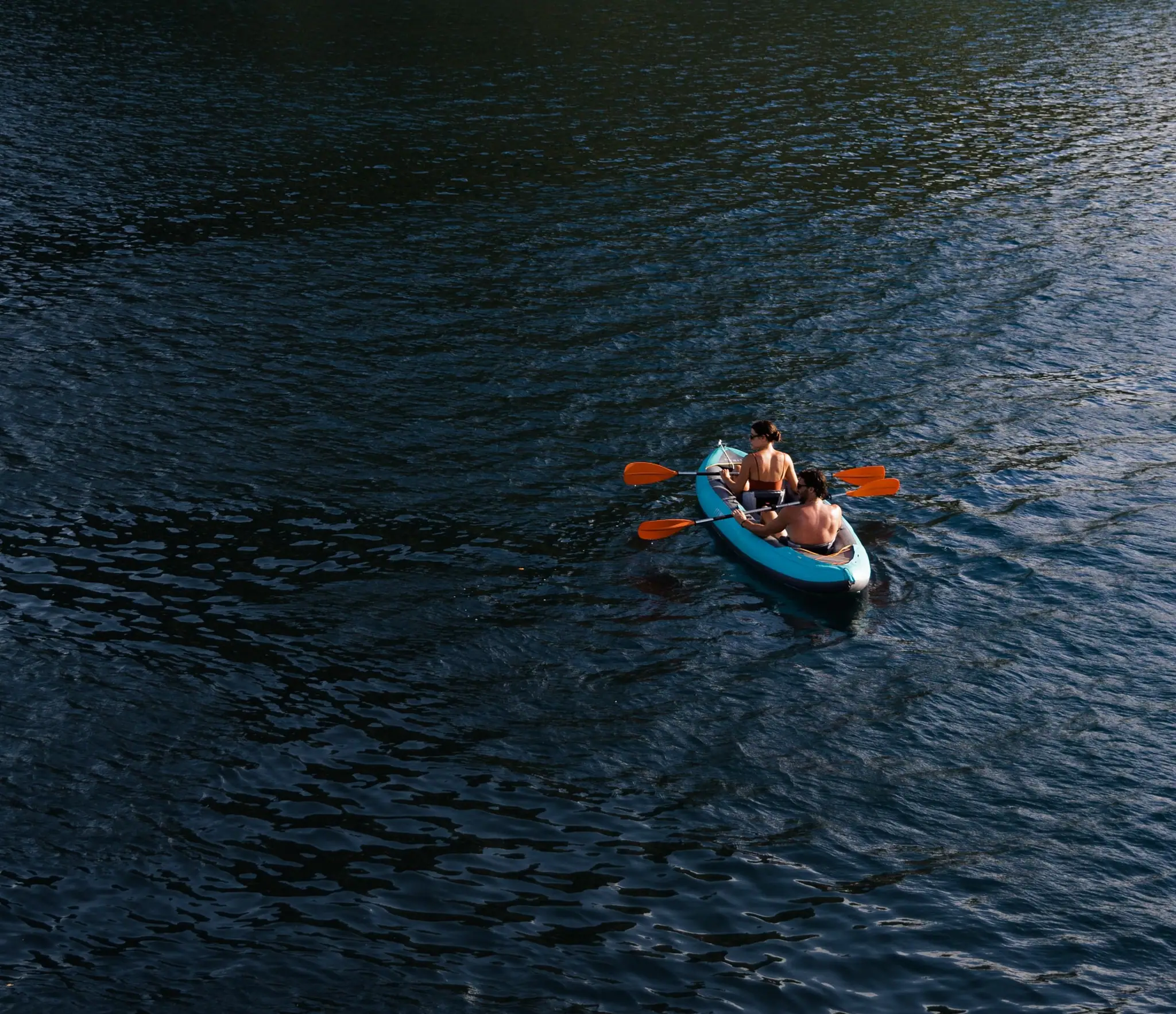 Vela Luxury Phinisi Yacht | Kayaking through calm tropical waters