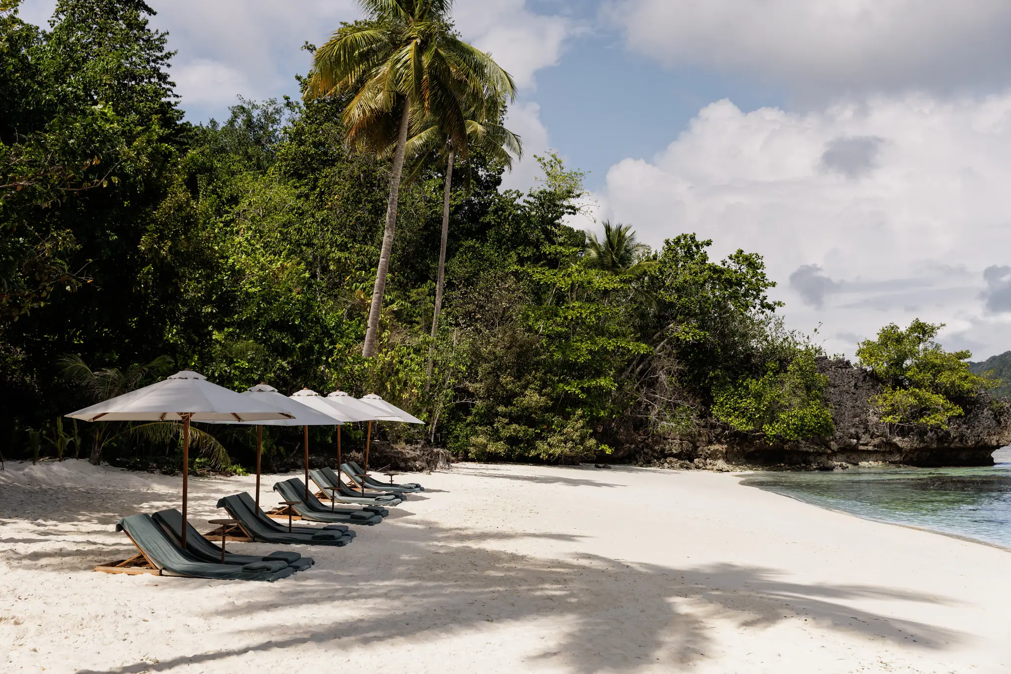 Vela Luxury Phinisi Yacht | Private tropical beach loungers