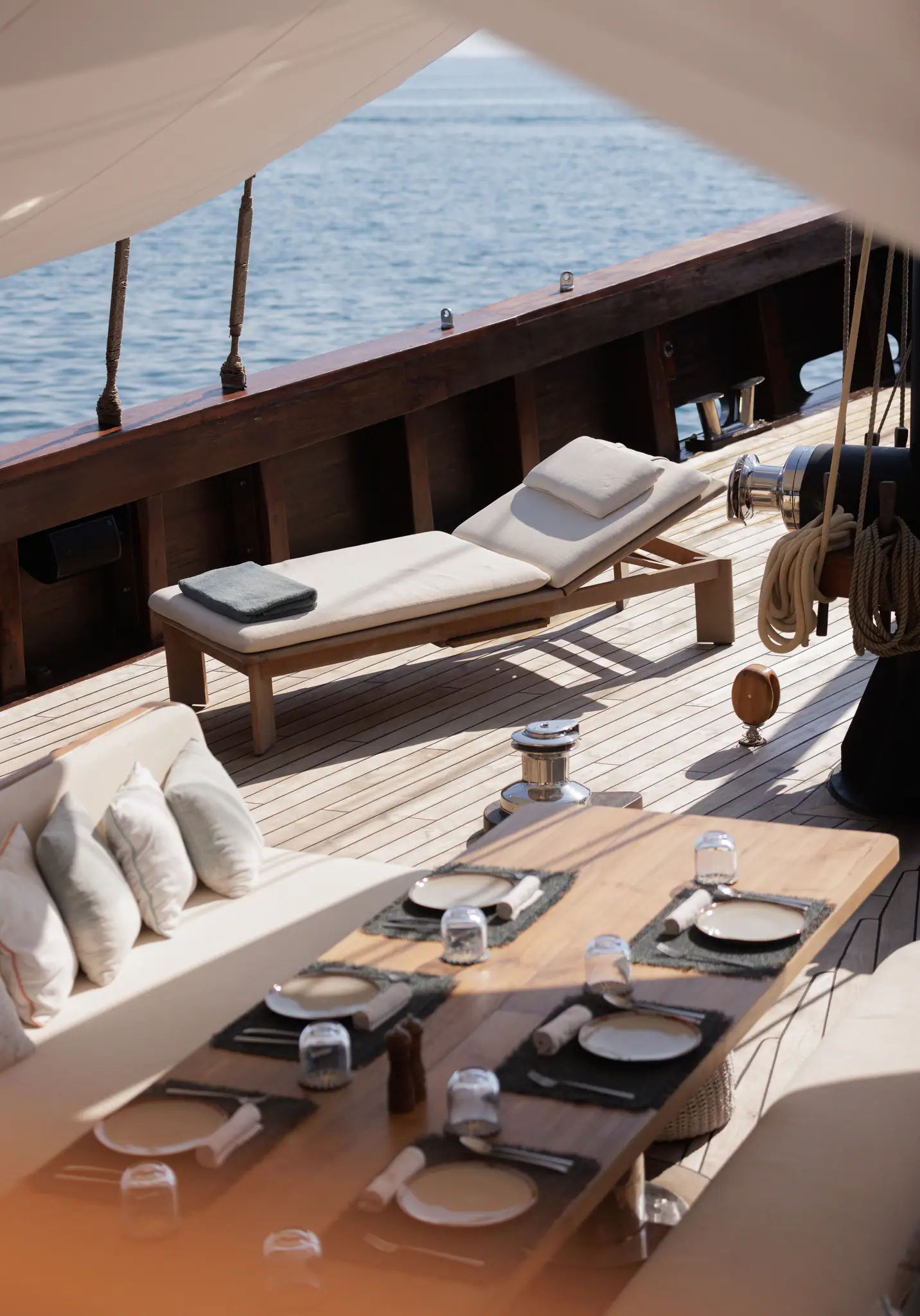 Vela Luxury Phinisi Yacht | Sun loungers on teak deck