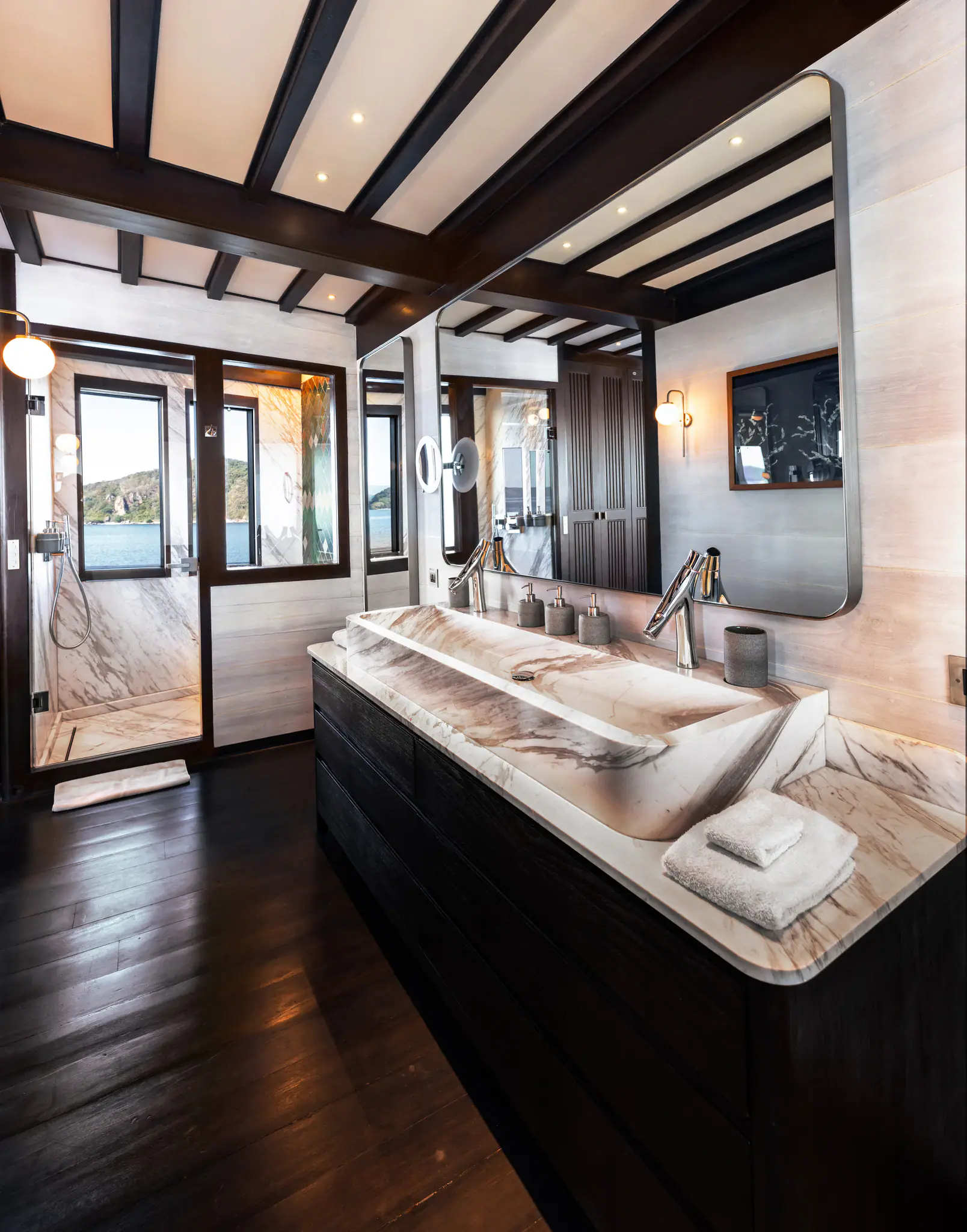 Vela Luxury Phinisi Yacht | Elegant marble bathroom interior