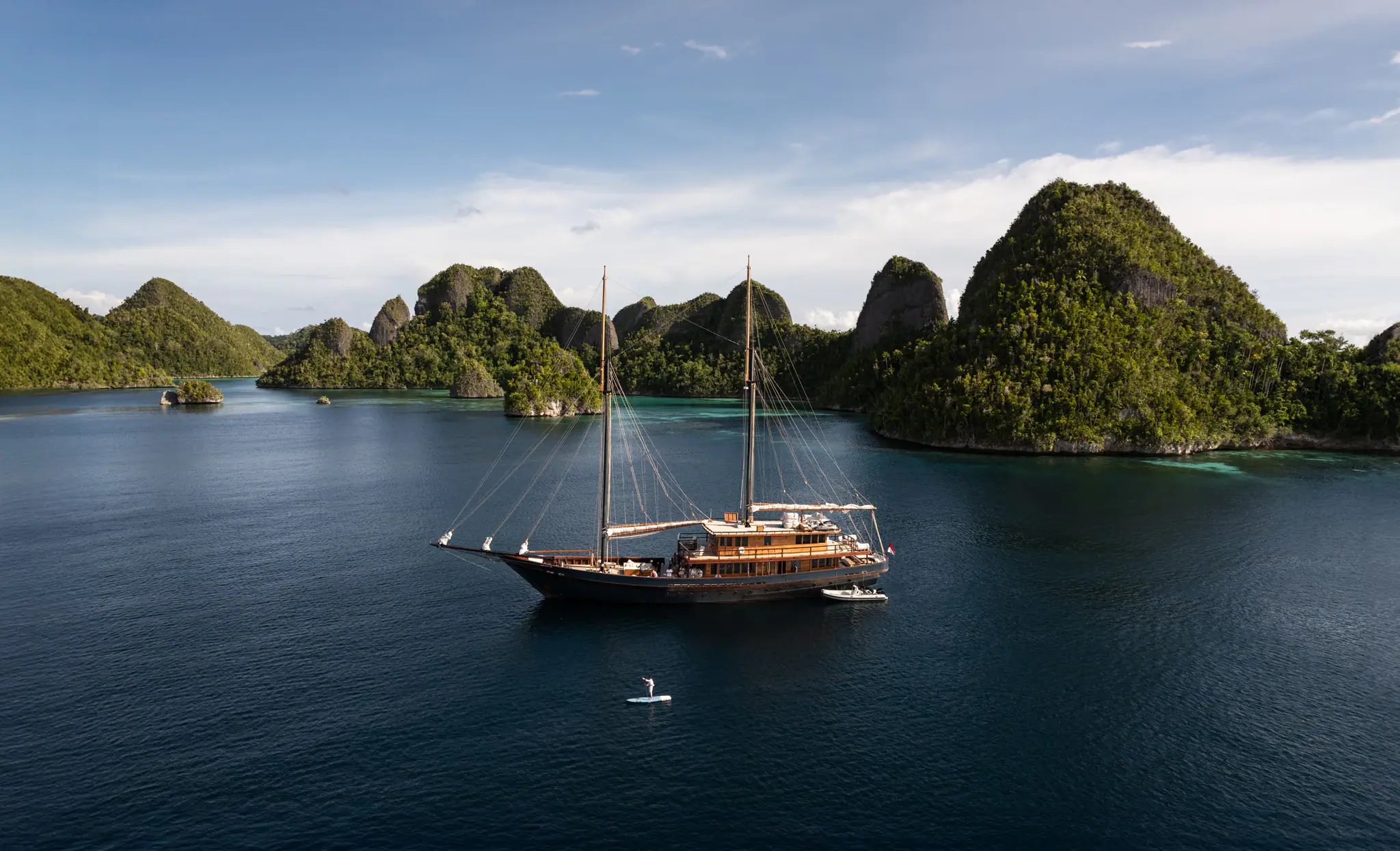 Vela Luxury Phinisi Yacht | Anchored in Raja Ampat lagoon